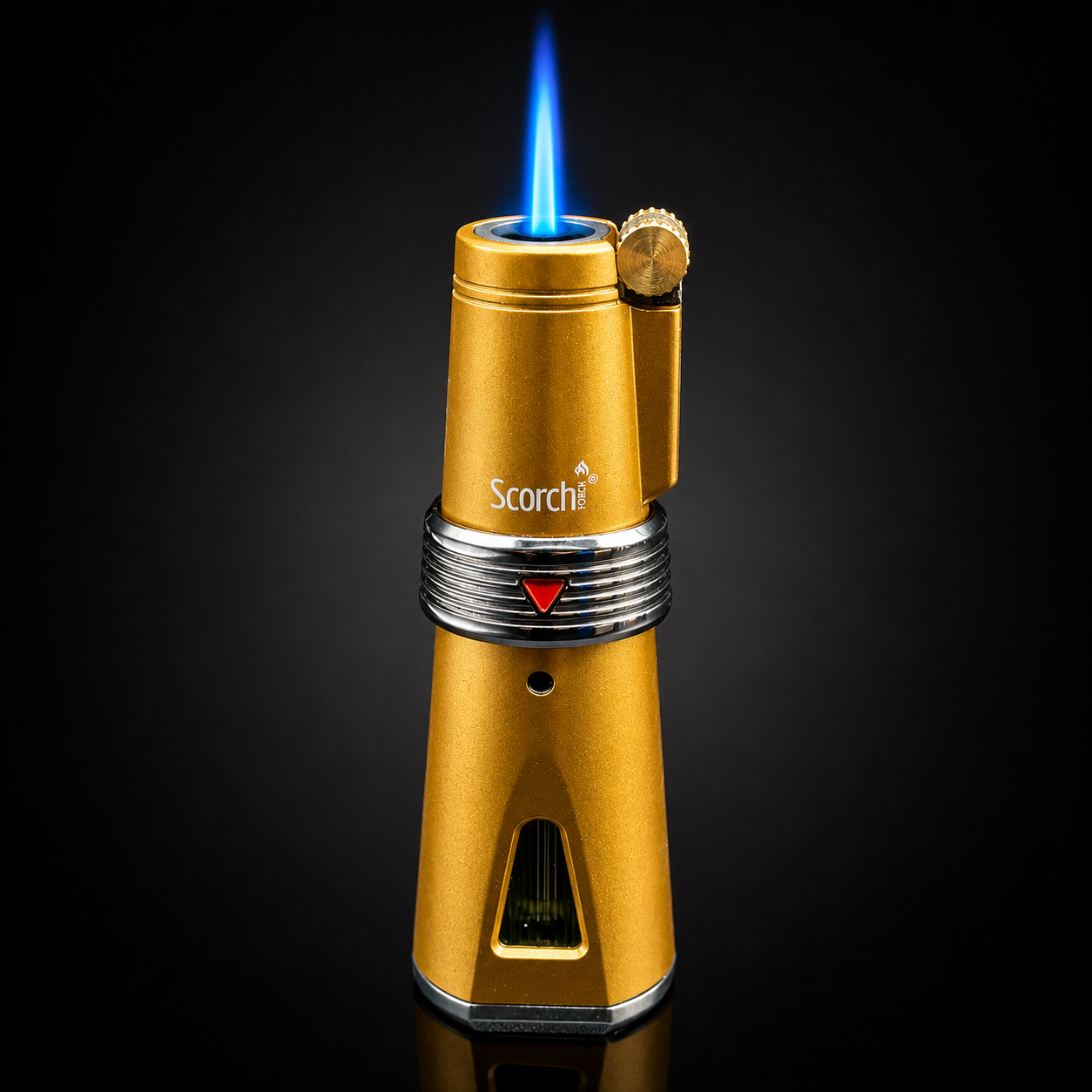 Gold torch lighter with blue flame on a black background