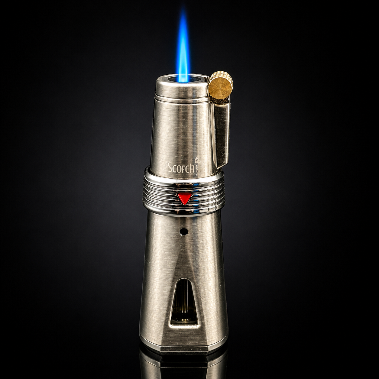 Metallic lighter with blue flame on a black background