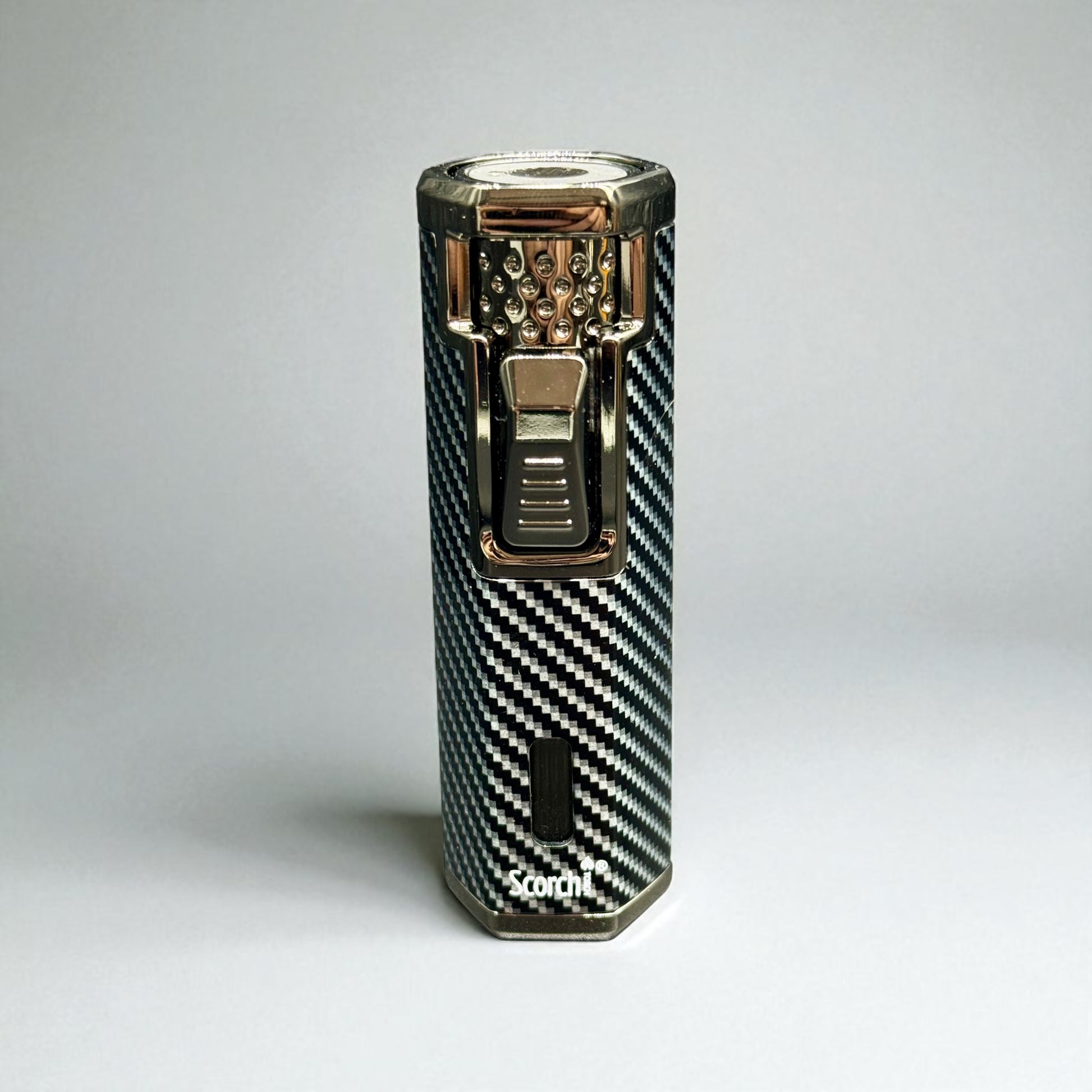 Carbon fiber patterned lighter with metallic accents on a gray background