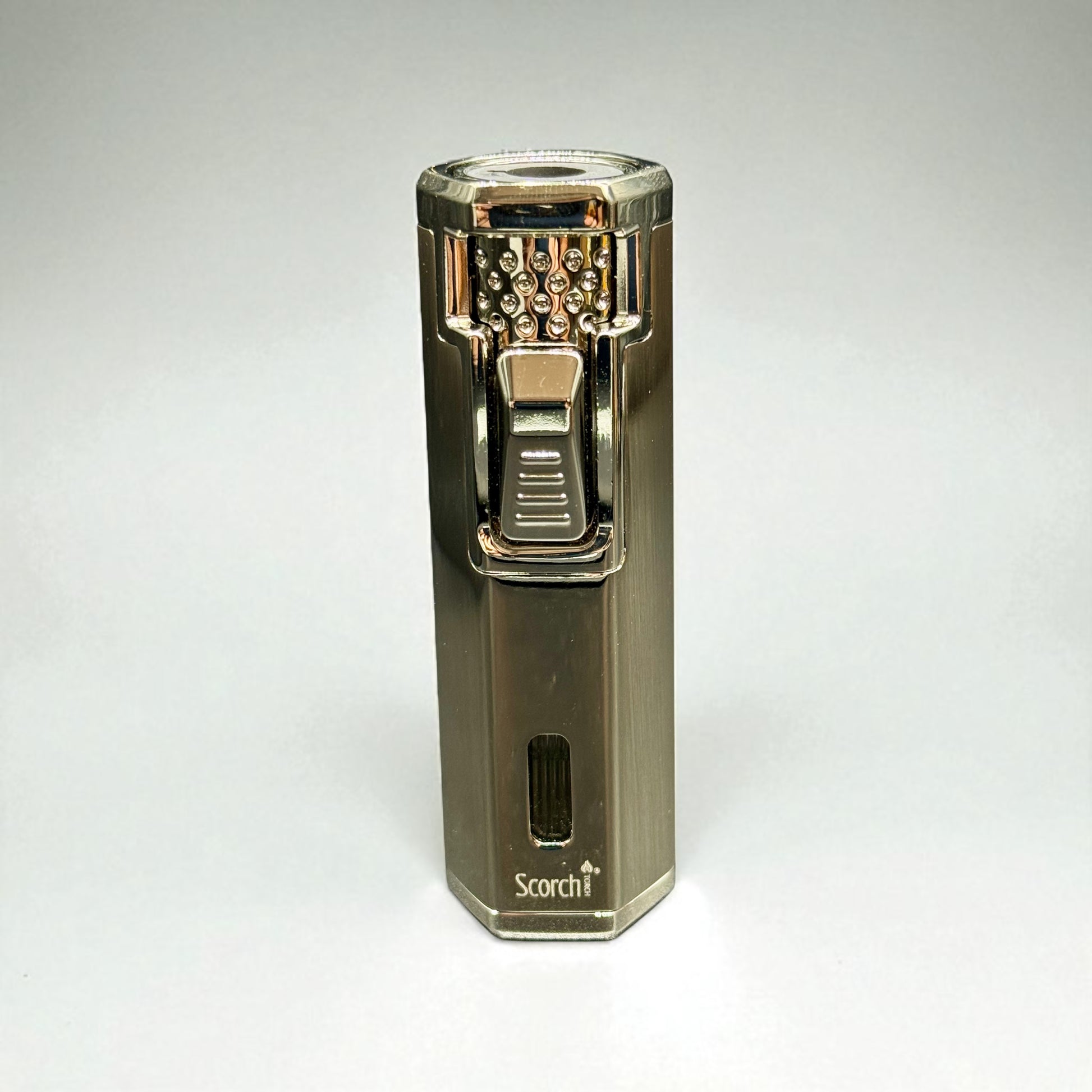 Gold and silver lighter with 'Scorch' branding on a white background