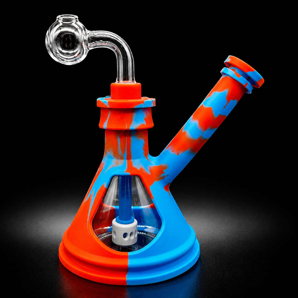Glass smoking device with orange and blue silicone cover on a black background