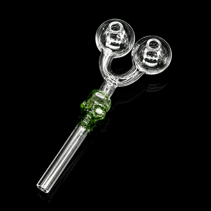 Glass smoking accessory with green base on a black background