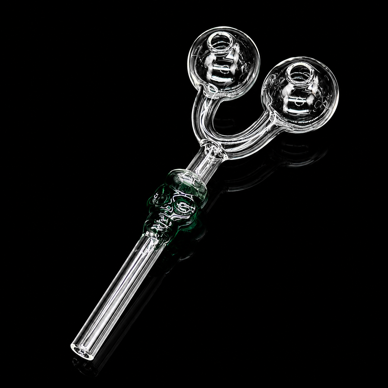 Glass smoking device with two chambers on a black background