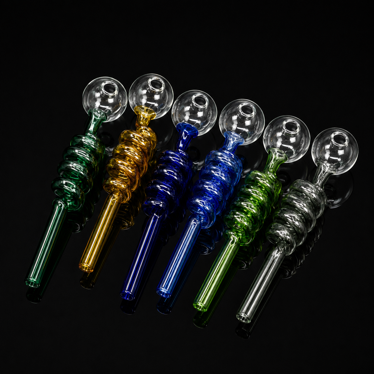 Set of colorful glass pipes on a black background