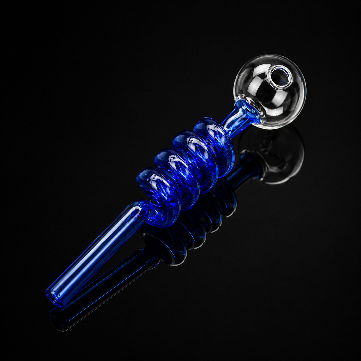 Blue glass pipe with spiral design on a black background