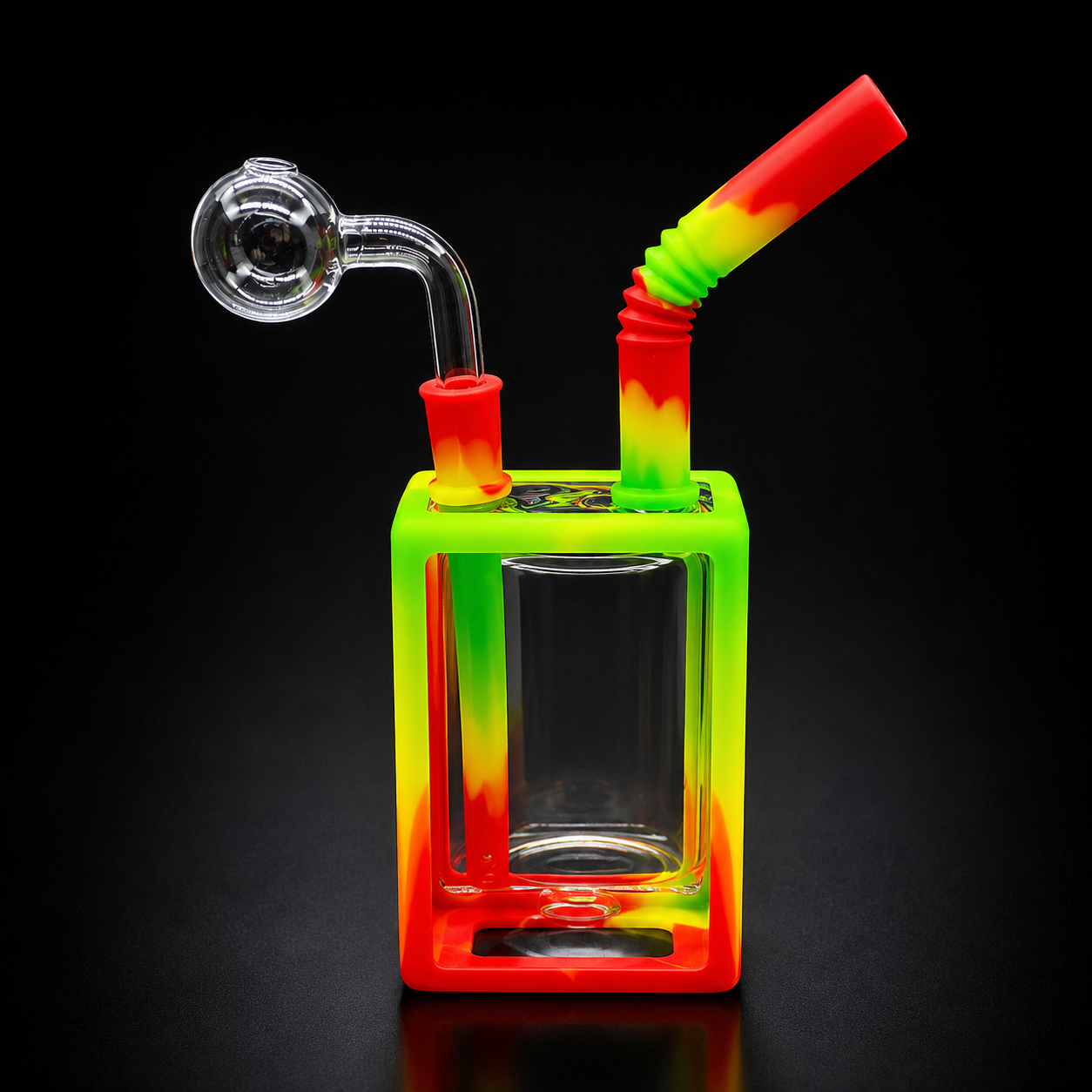 Colorful glass smoking device with a straw on a black background