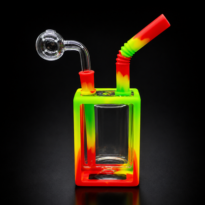Colorful glass smoking device with a straw on a black background