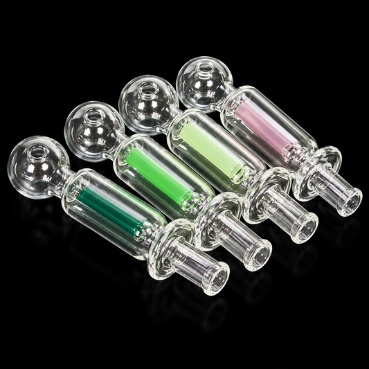 Set of clear glass smoking accessories with colored chambers on a black background