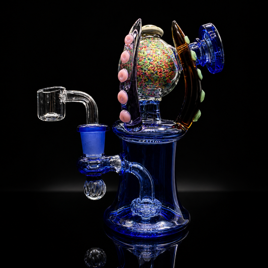 Glass smoking device with colorful beads on a black background