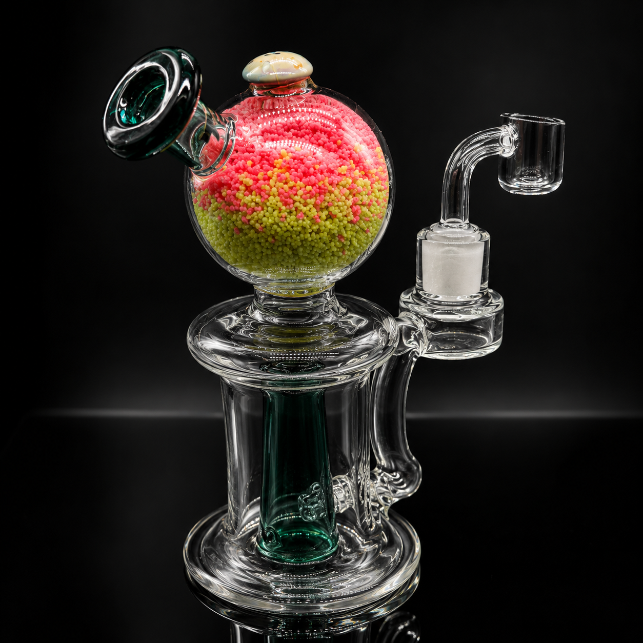 Glass smoking device with colorful spherical chamber on a black background