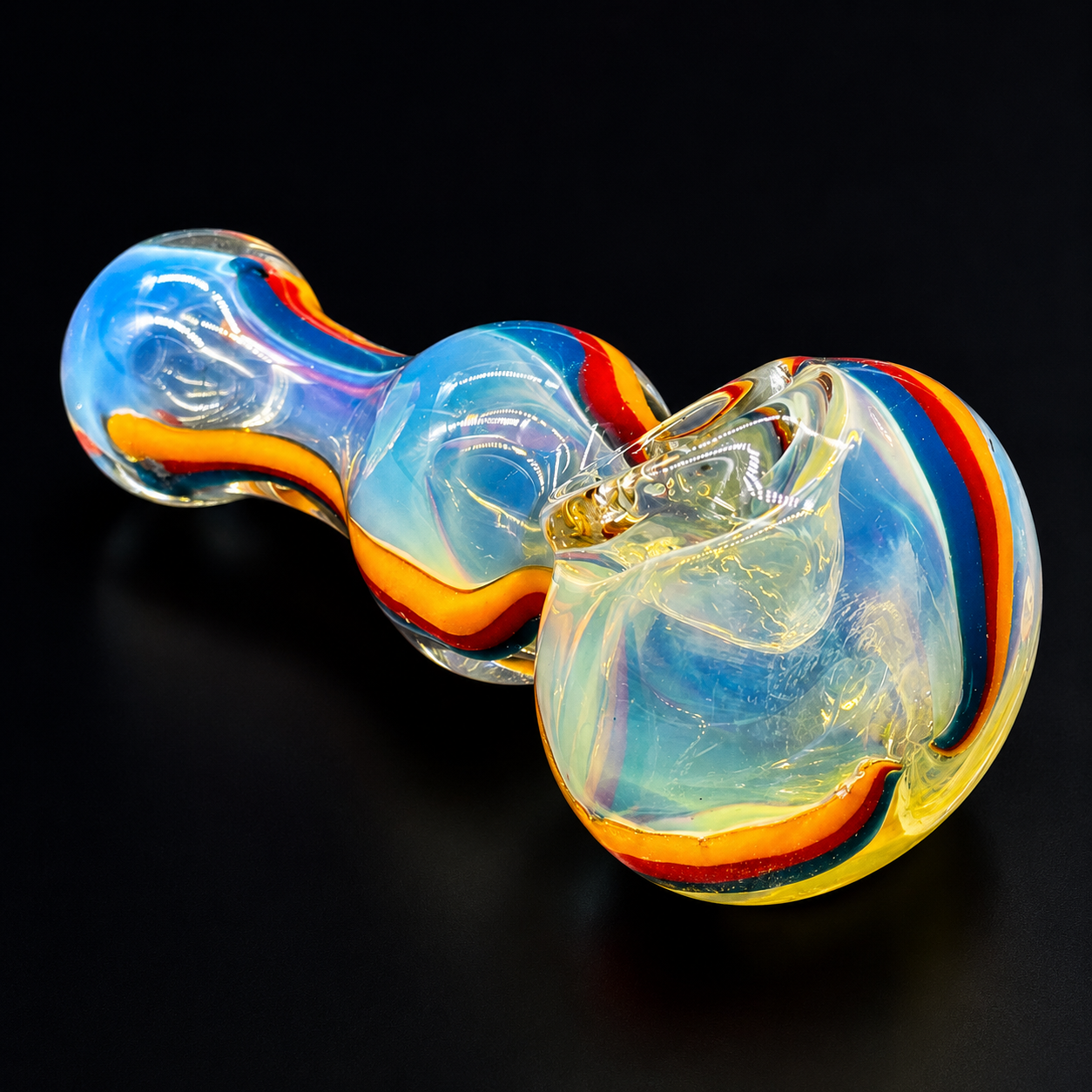 Colorful glass pipe on a black background
