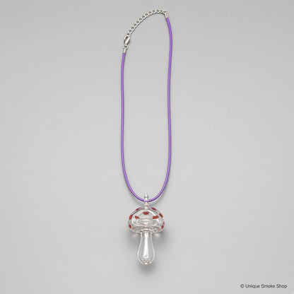 Mini hand-blown clear mushroom shaped glass pipe necklace with red dots on purple cord