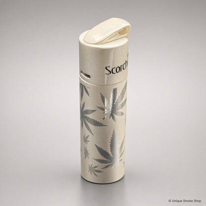 Scorch Torch 61838 cream metal single-flame lighter with cannabis leaf pattern, top lid view, 3 inches tall.
