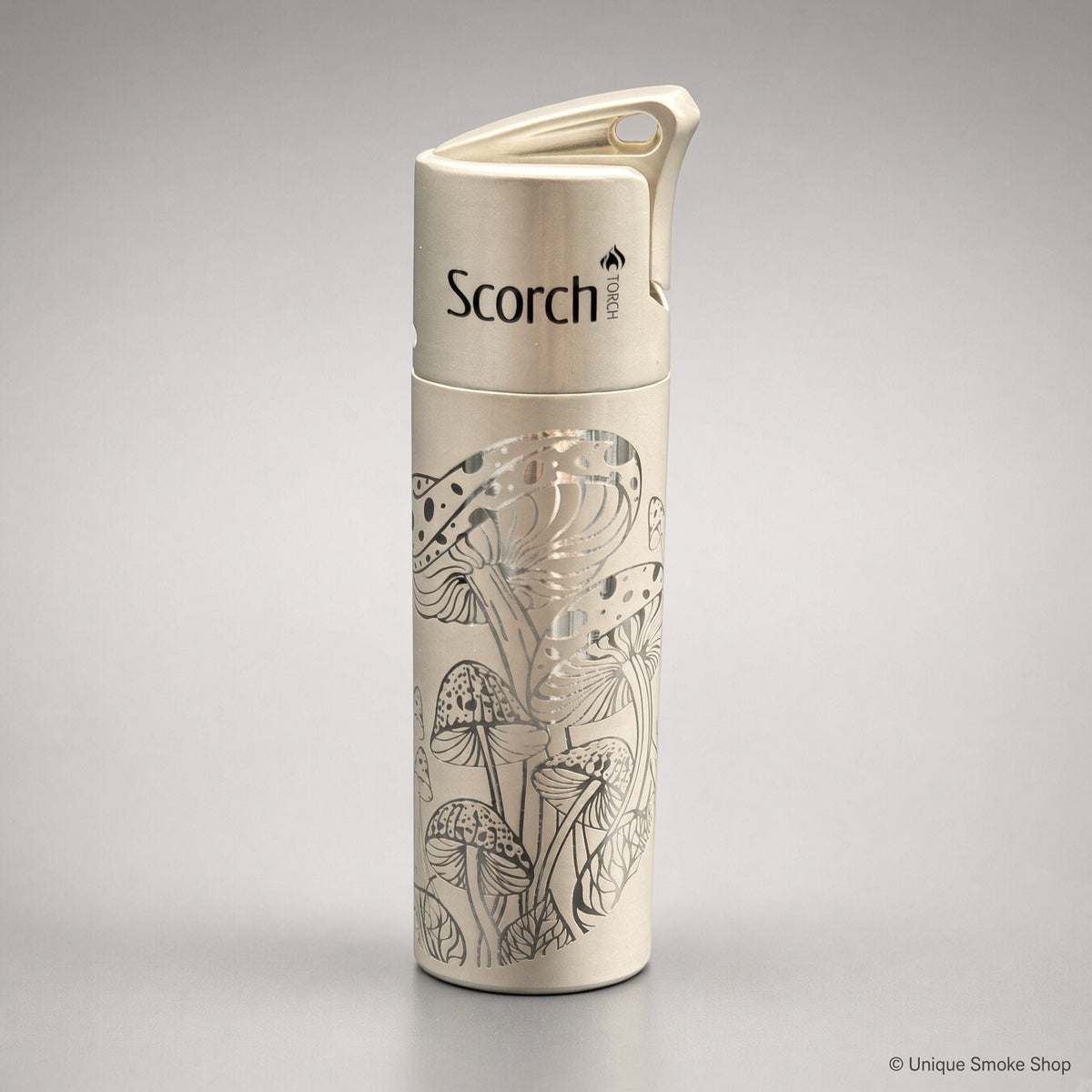 Scorch Torch 61838 cream metal single-flame lighter with mushroom pattern, front view, 3 inches tall.