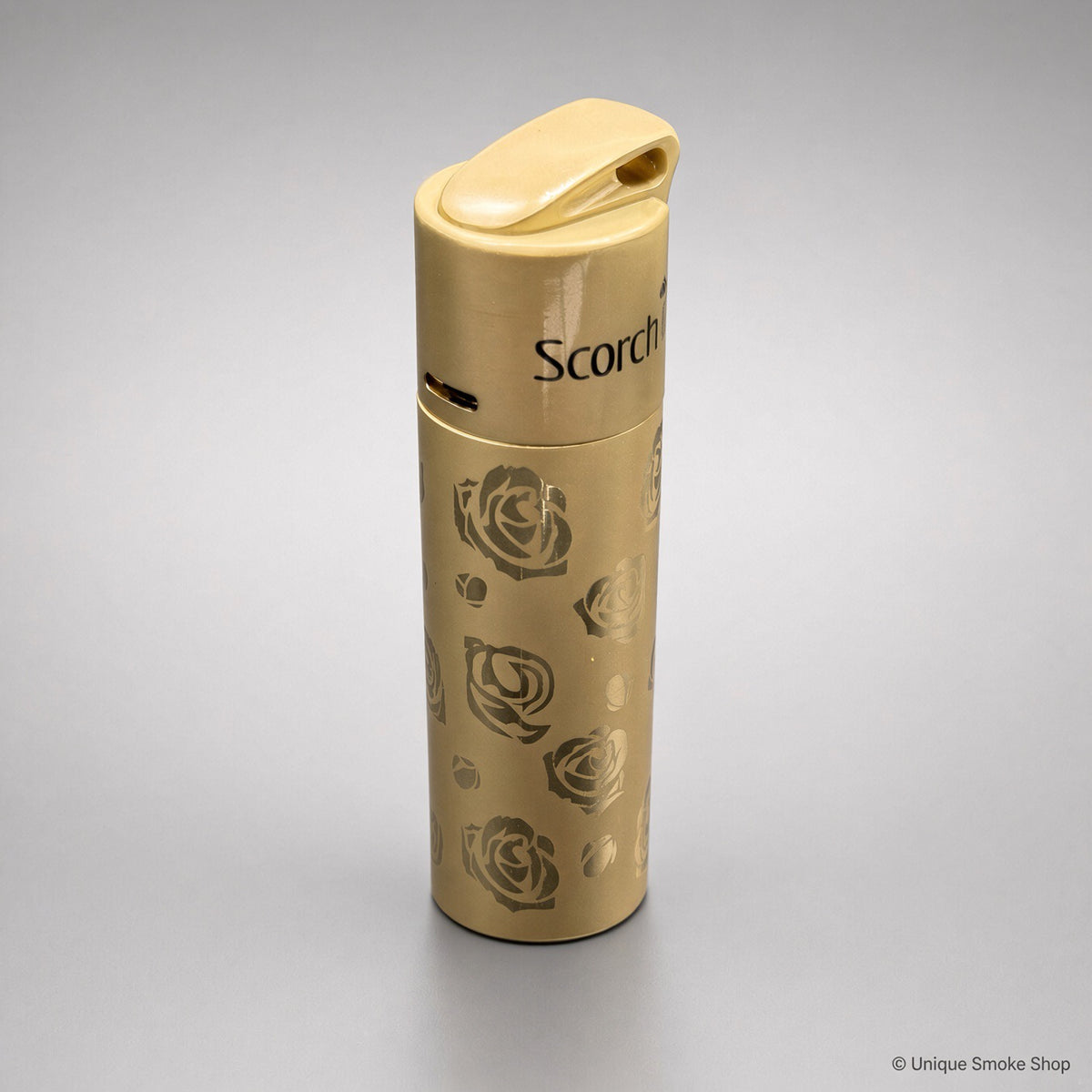 Scorch Torch 61838 gold metal single-flame lighter with rose pattern, top lid view, 3 inches tall.