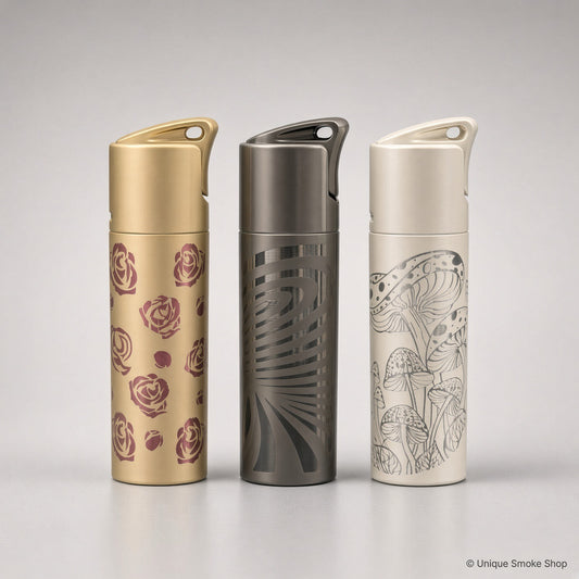 Scorch Torch 61838 group of three metal single-flame lighters: gold rose, gunmetal swirl, and cream mushroom, 3 inches tall.
