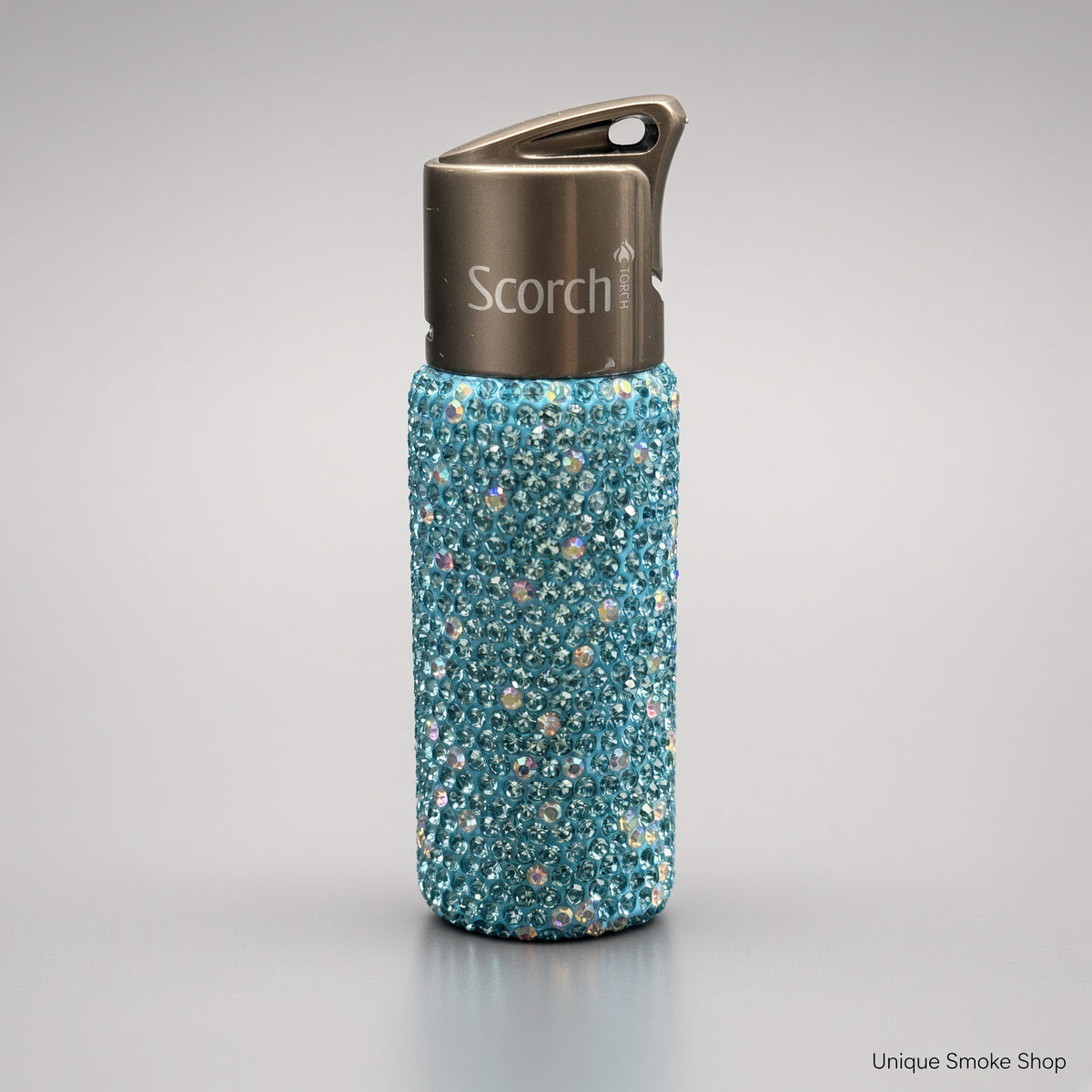 Teal rhinestone Scorch 61892 single flame torch lighter with gunmetal cap, front view