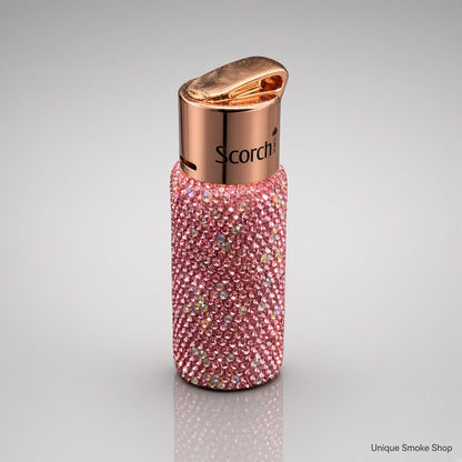 Pink rhinestone Scorch 61892 torch lighter top three-quarter view showing rose gold lid and Scorch logo