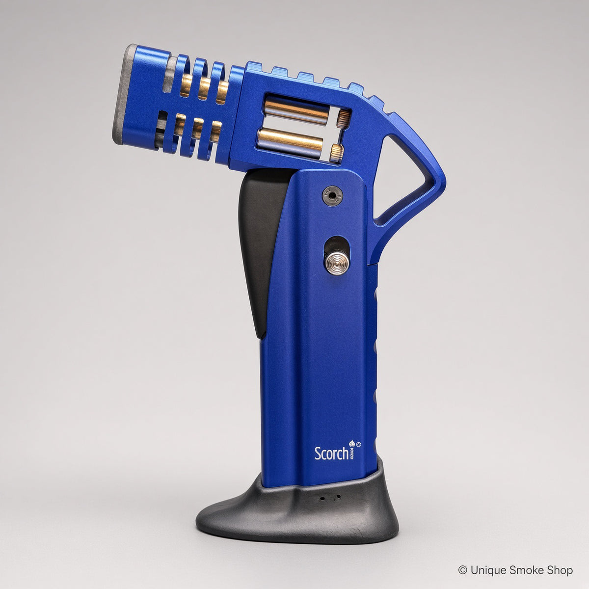 Blue Scorch Torch Lighter with gold internals, side view, standing on base – Unique Smoke Shop