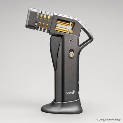 Gray Scorch Torch Lighter metallic finish with gold internals, side view – Unique Smoke Shop