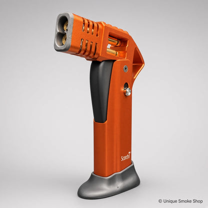 Orange Scorch Torch Lighter front view with dual nozzles and gold accents – Unique Smoke Shop